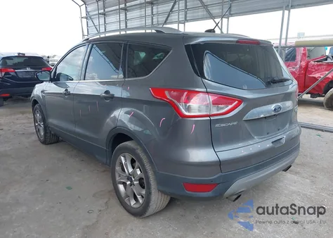 2014 Ford Escape Titanium z USA, uszkodzony, nr VIN 1FMCU0J9XEUE11657